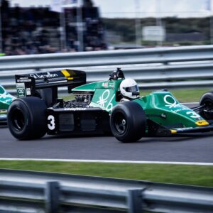 Man Riding on Racing Car